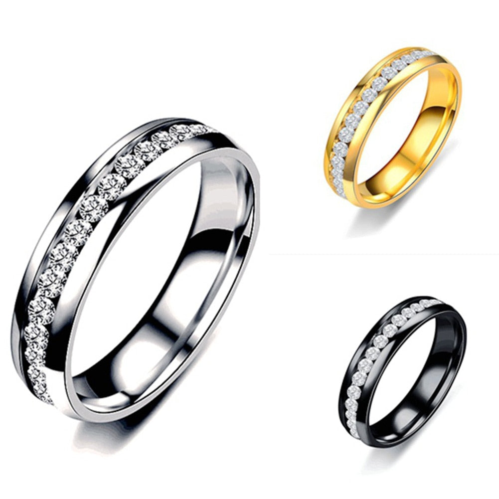 Woman's Exquisite Stainless Steel wedding Ring. Comes in Black, Gold or Silver.
