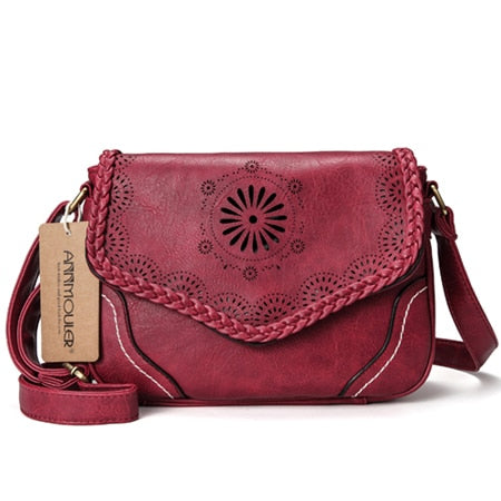 Annmouler Ladies leather crossbody handbag.