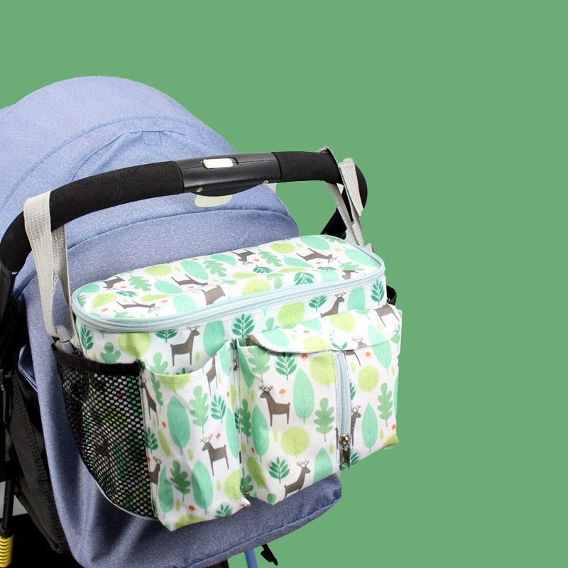 Stroller organizer bag for diapers, baby bottles and toys.