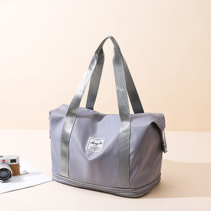 Women's AOTTLA casual handbag/carry on luggage bag for traveling. Double zipper on bottom to expand bag..