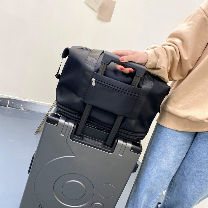 Women's AOTTLA casual handbag/carry on luggage bag for traveling. Double zipper on bottom to expand bag..