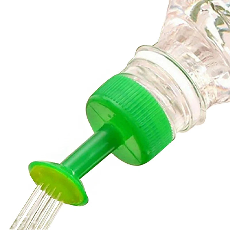 Plant Watering Spray-Head Attachment That Fits Soft Drink Bottles.