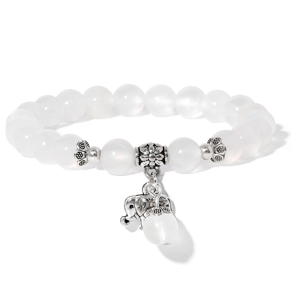 Ladies blue amazonite beaded bracelet with a metal elephant charm.