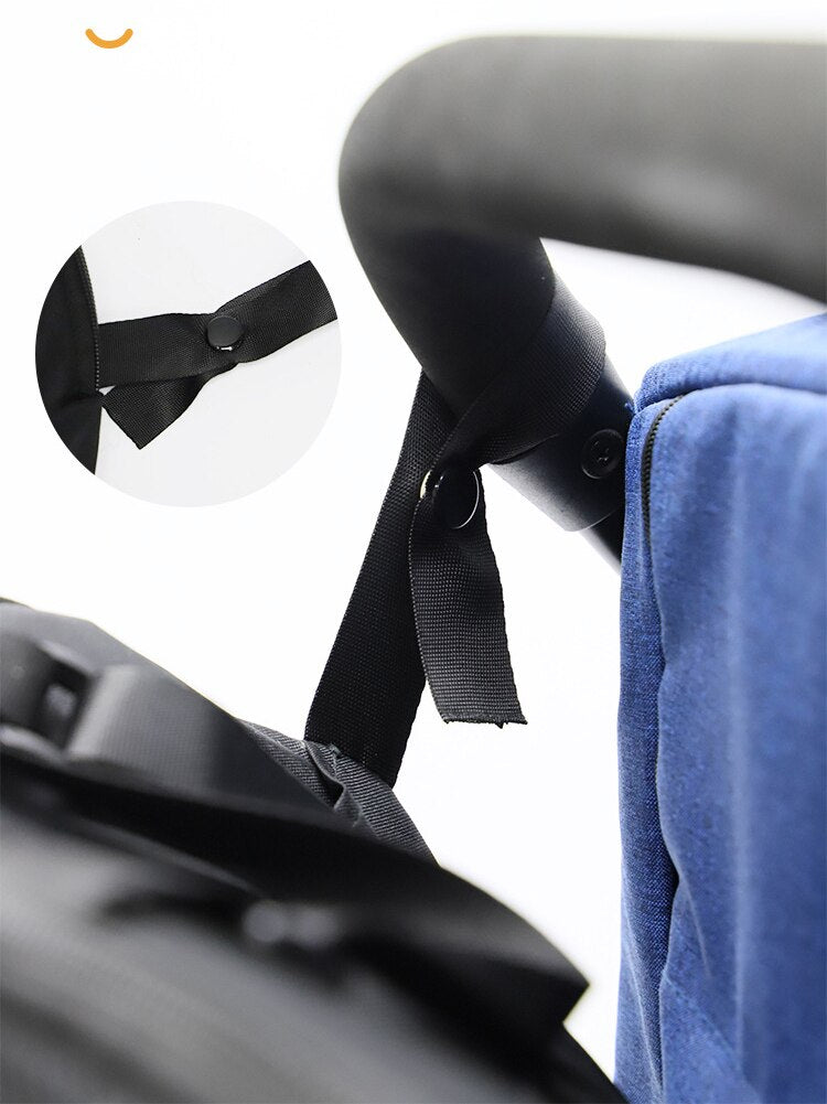 Stroller organizer bag for diapers, baby bottles and toys.