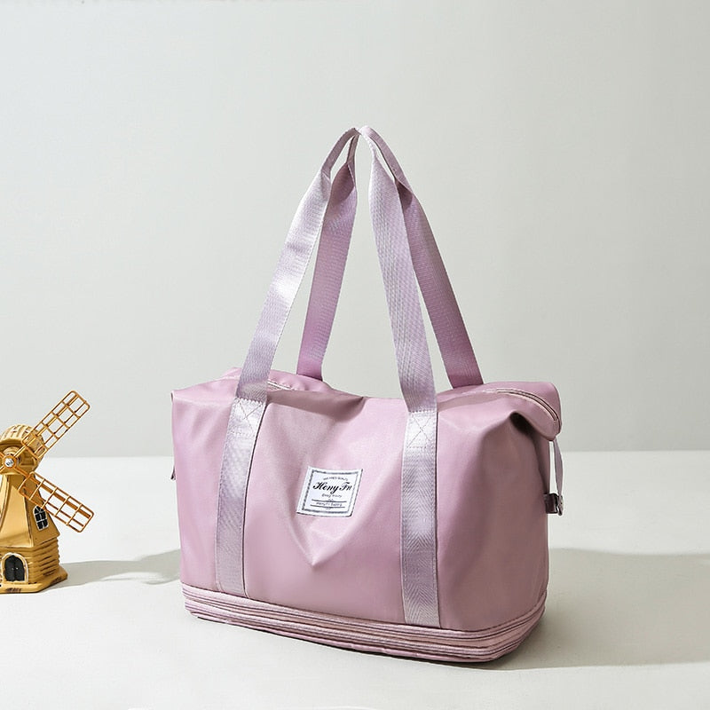 Women's AOTTLA casual handbag/carry on luggage bag for traveling. Double zipper on bottom to expand bag..