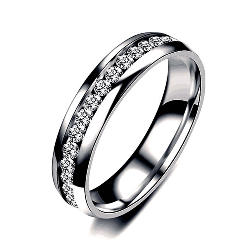 Woman's Exquisite Stainless Steel wedding Ring. Comes in Black, Gold or Silver.
