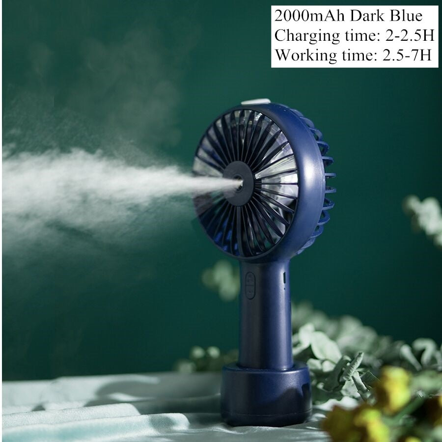 USB Rechargeable Handheld Mini cooling fan with water spray mist.