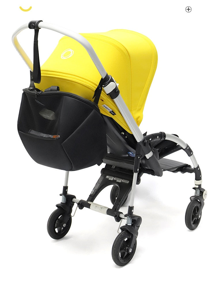 Stroller organizer bag for diapers, baby bottles and toys.