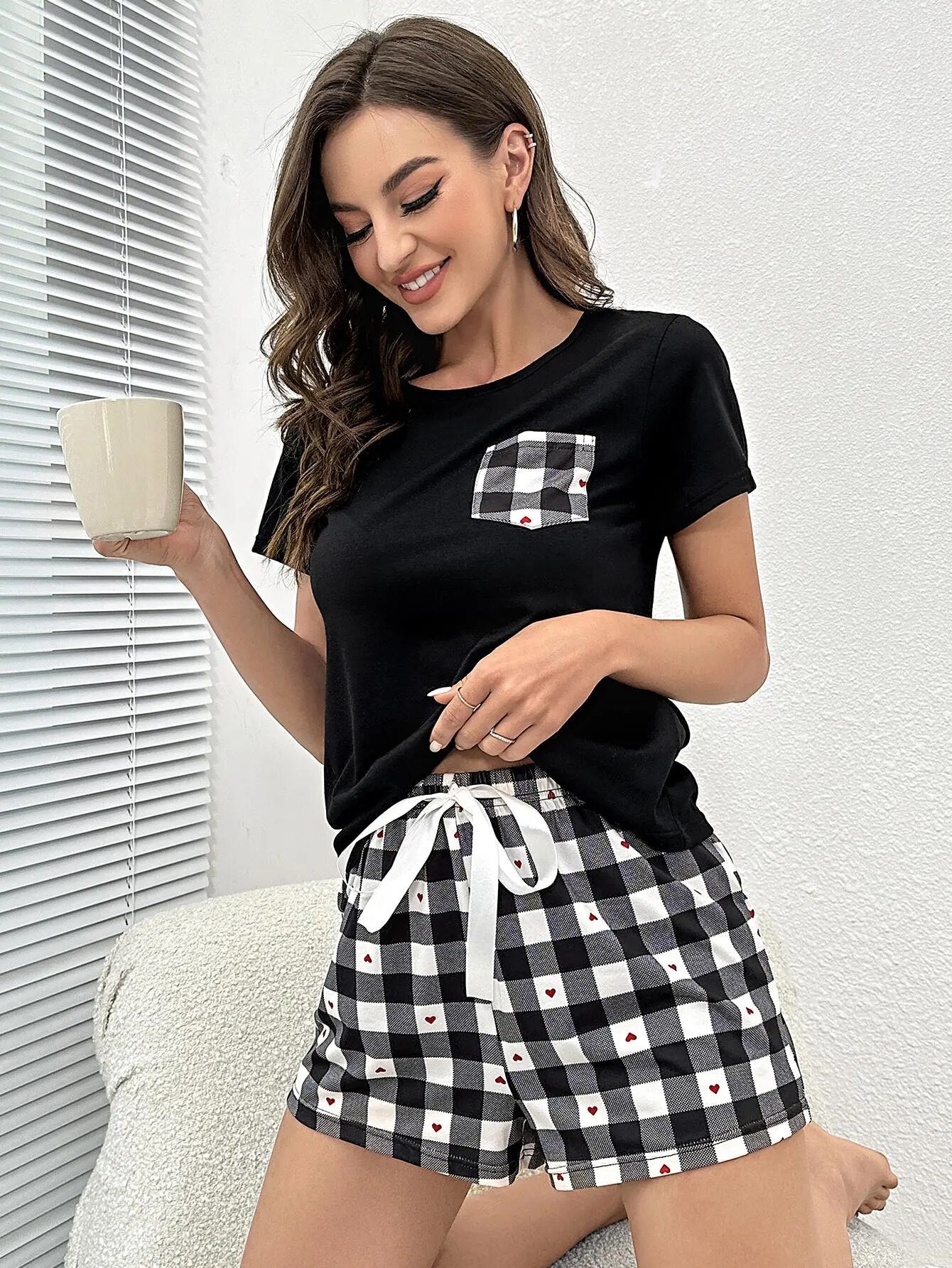Women's Pajamas Set With Tee Shirt And Elastic Drawstring Shorts.