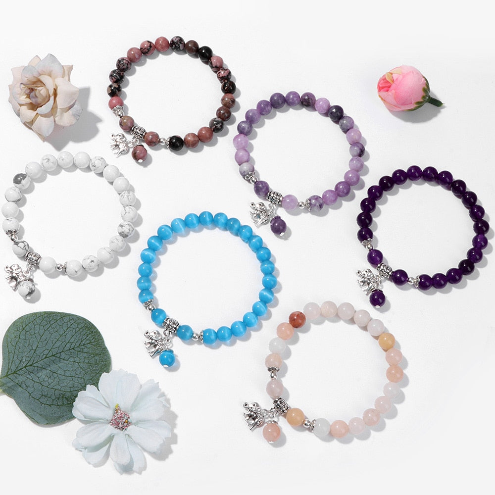 Ladies blue amazonite beaded bracelet with a metal elephant charm.