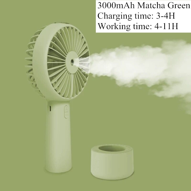 USB Rechargeable Handheld Mini cooling fan with water spray mist.