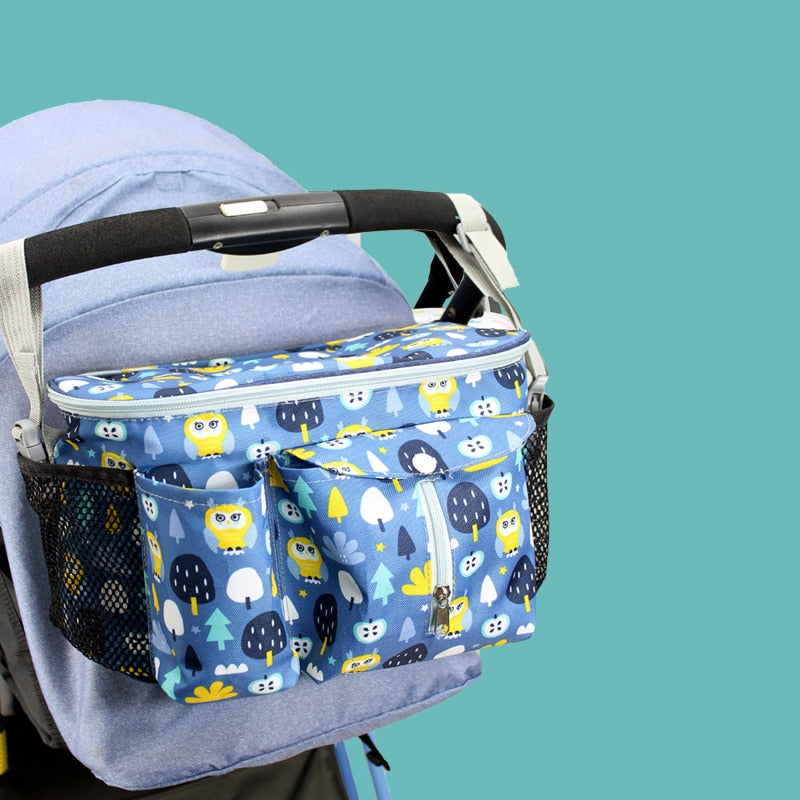 Stroller organizer bag for diapers, baby bottles and toys.