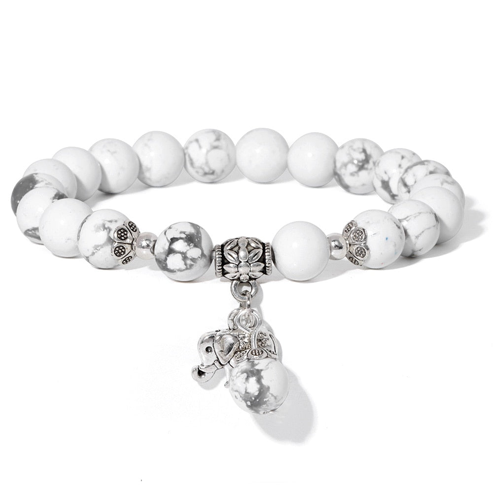 Ladies blue amazonite beaded bracelet with a metal elephant charm.