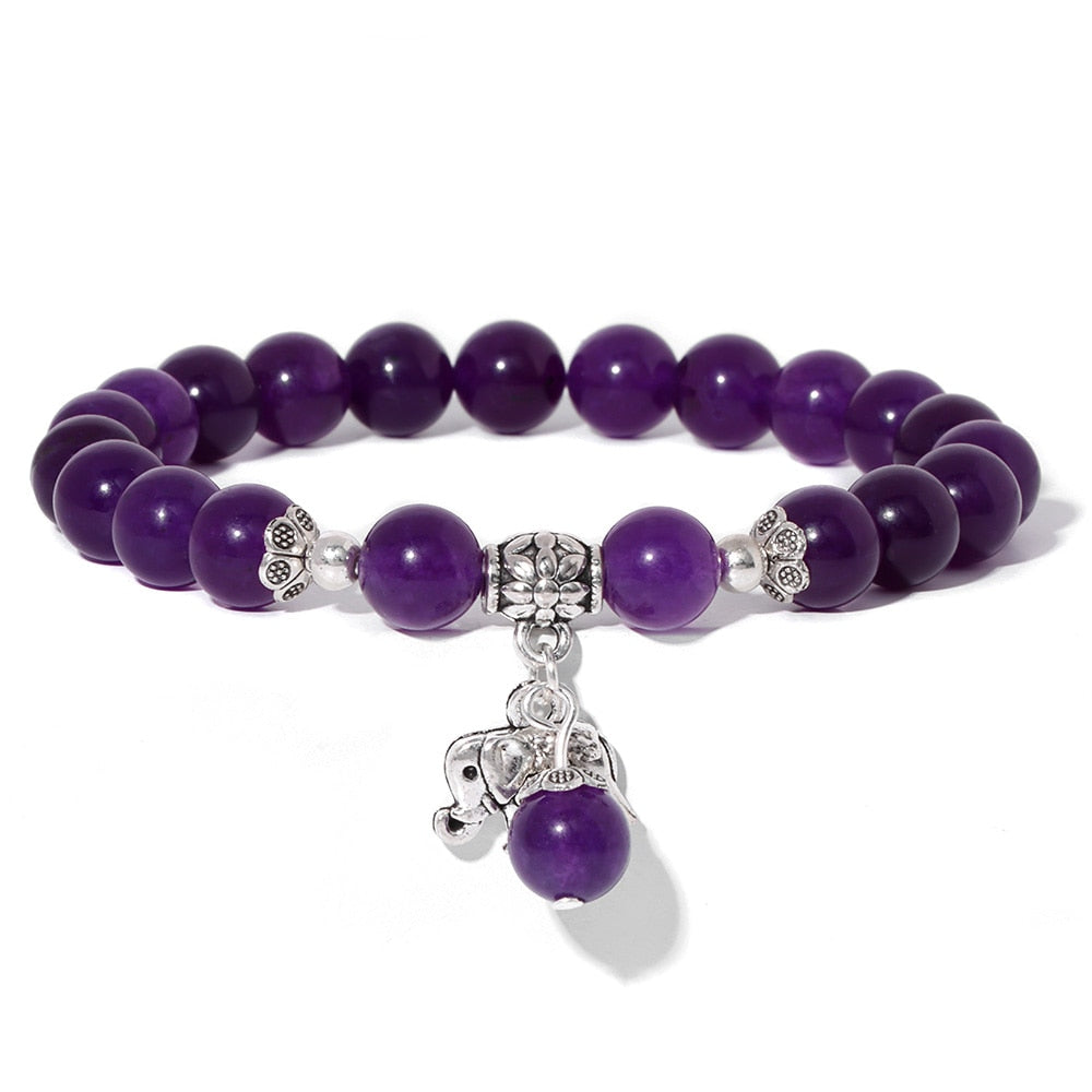 Ladies blue amazonite beaded bracelet with a metal elephant charm.