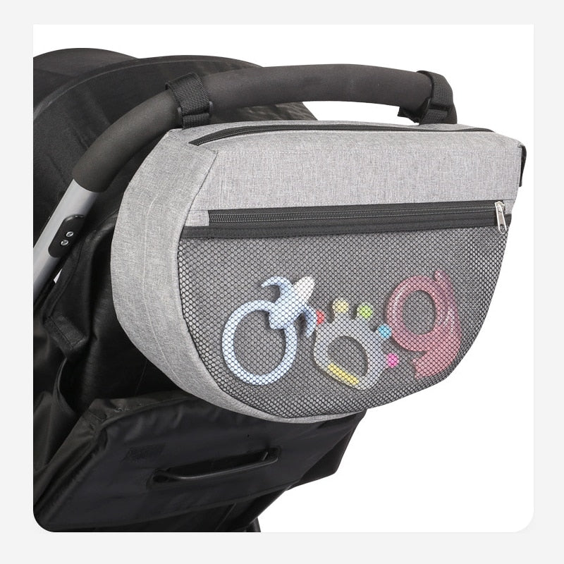 Stroller organizer bag for diapers, baby bottles and toys.