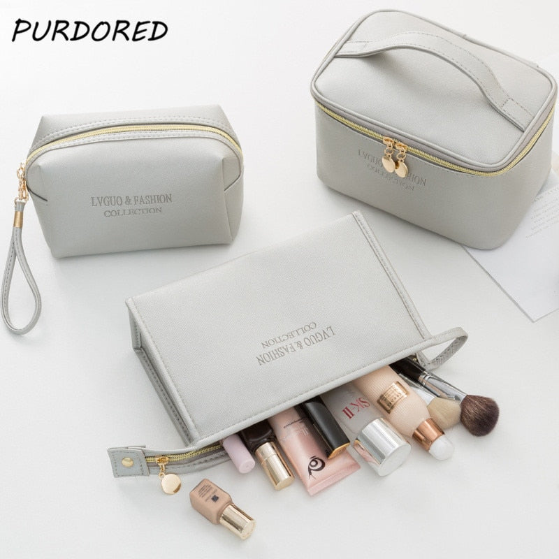PURDORED 1 Pc women's Leather cosmetic Bag. Leather Waterproof Zipper Make Up organizer.