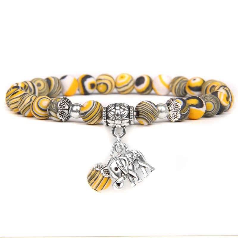 Ladies blue amazonite beaded bracelet with a metal elephant charm.