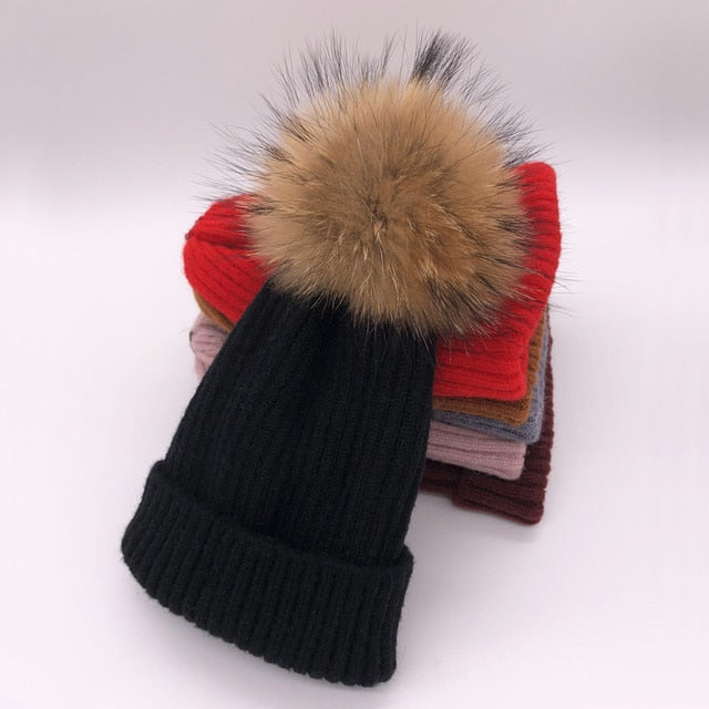 Wool/acrylic, fox fur pompom winter hats.