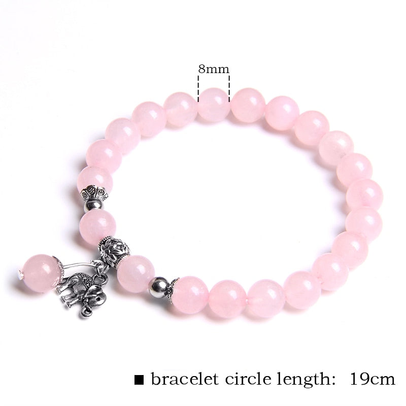 Ladies blue amazonite beaded bracelet with a metal elephant charm.