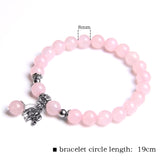Ladies blue amazonite beaded bracelet with a metal elephant charm.
