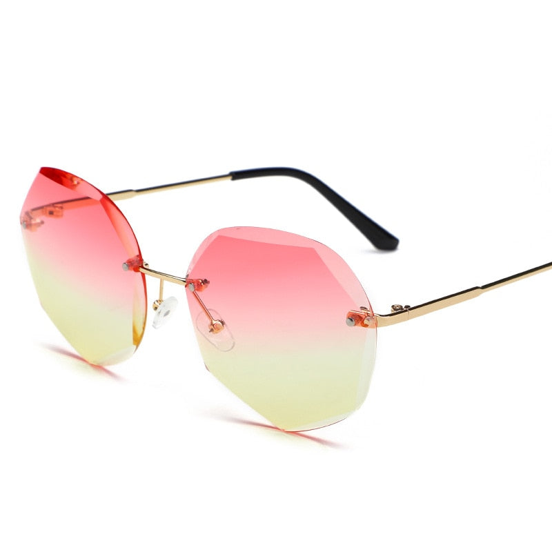 Women's rimless Gradient designer sunglasses.