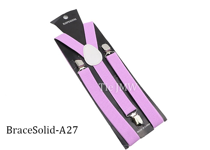 Leather Suspenders With Elastic Adjustable Straps.  Comes in a variety of solid Colors.