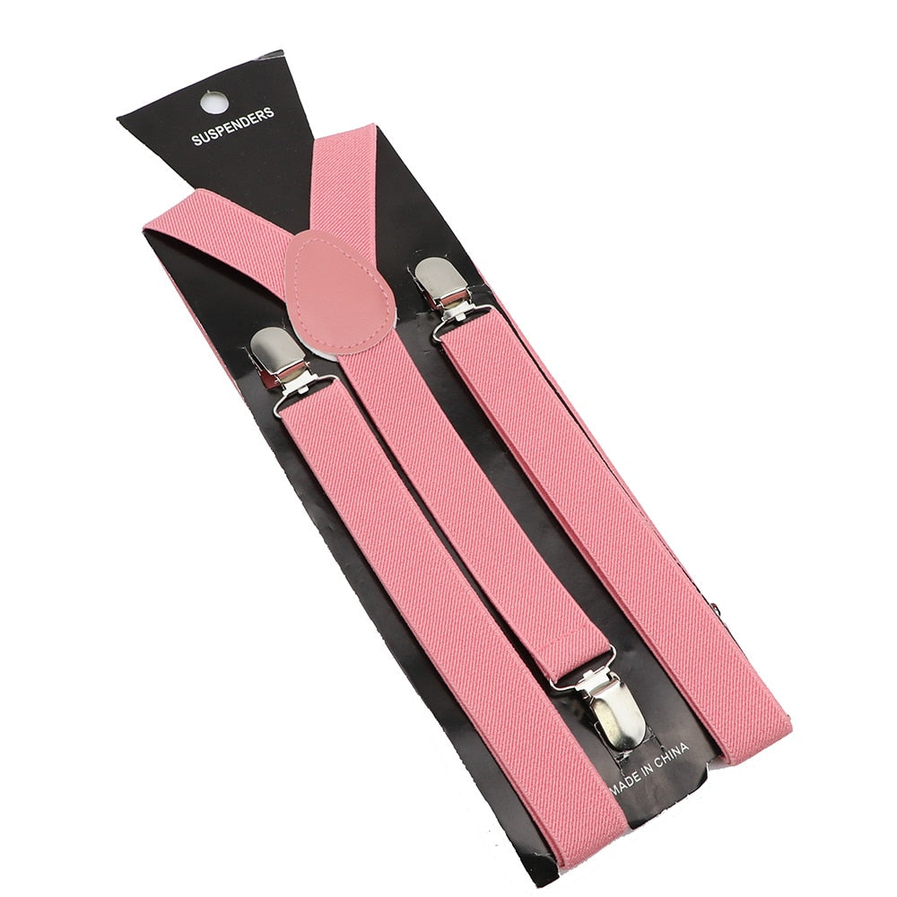 Leather Suspenders With Elastic Adjustable Straps.  Comes in a variety of solid Colors.