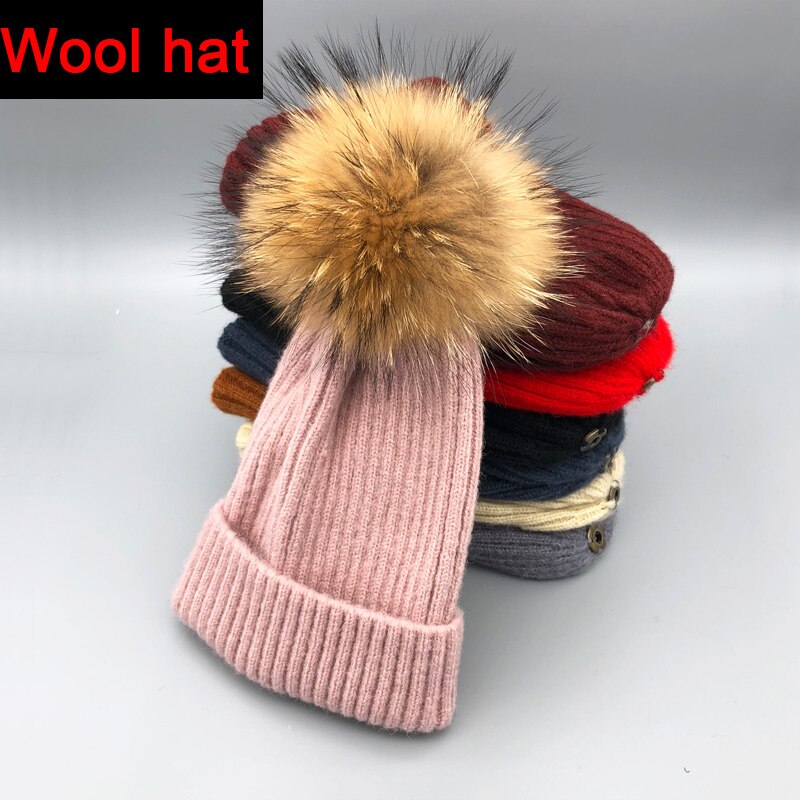 Wool/acrylic, fox fur pompom winter hats.