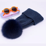 Wool/acrylic, fox fur pompom winter hats.