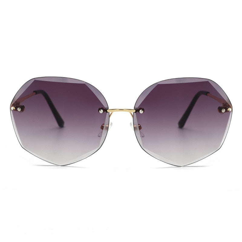 Women's rimless Gradient designer sunglasses.