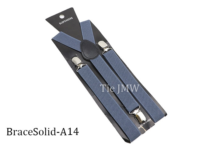 Leather Suspenders With Elastic Adjustable Straps.  Comes in a variety of solid Colors.