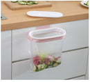 Kitchen Garbage Bag Rack that hangs on the front or back of the cupboard door.  Great for quick access