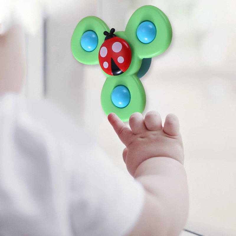 1pcs Cartoon Fidget Spinner.  Educational toy as well as rattle toy.