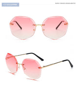 Women's rimless Gradient designer sunglasses.