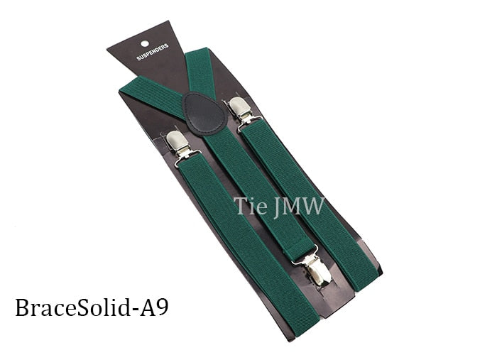 Leather Suspenders With Elastic Adjustable Straps.  Comes in a variety of solid Colors.