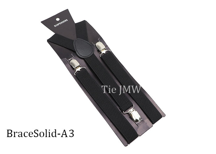Leather Suspenders With Elastic Adjustable Straps.  Comes in a variety of solid Colors.