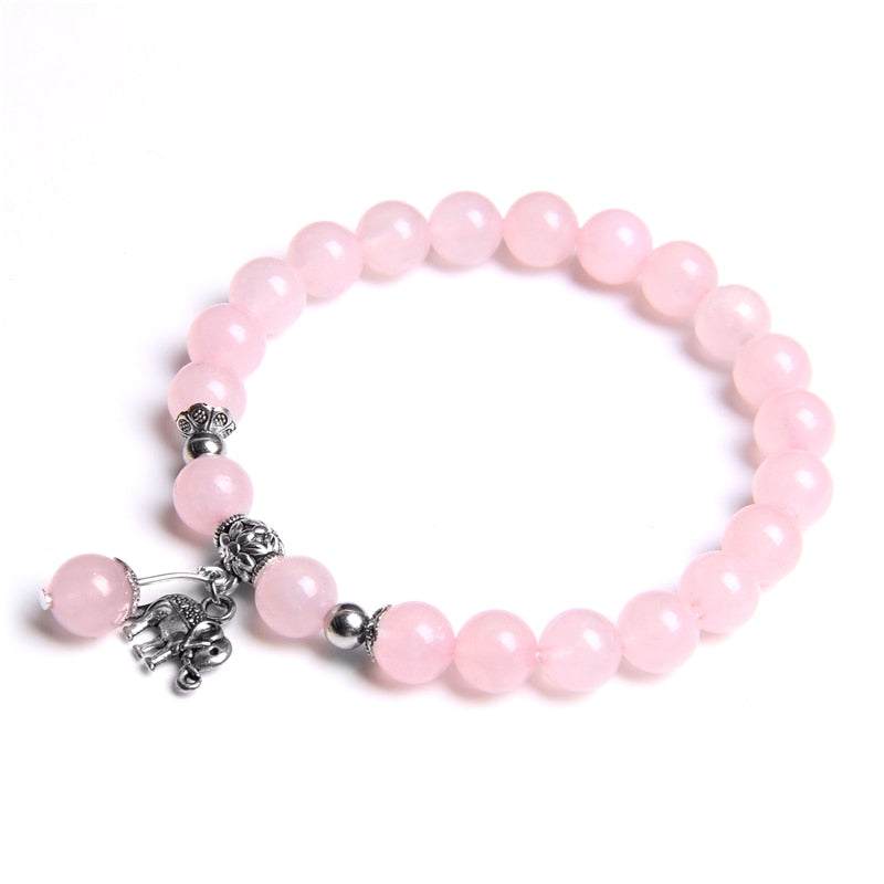 Ladies blue amazonite beaded bracelet with a metal elephant charm.