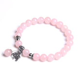 Ladies blue amazonite beaded bracelet with a metal elephant charm.