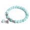 Ladies blue amazonite beaded bracelet with a metal elephant charm.