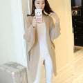 Ladies Long  Knitted, bat sleeve Sweater.