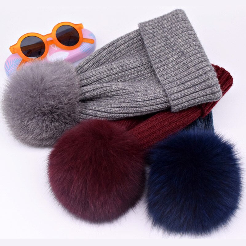 Wool/acrylic, fox fur pompom winter hats.