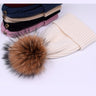 Wool/acrylic, fox fur pompom winter hats.