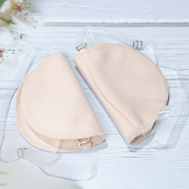 Perspiration Pads that attach over your shoulder.  Absorbing, Washable Shields to protect your best dress.