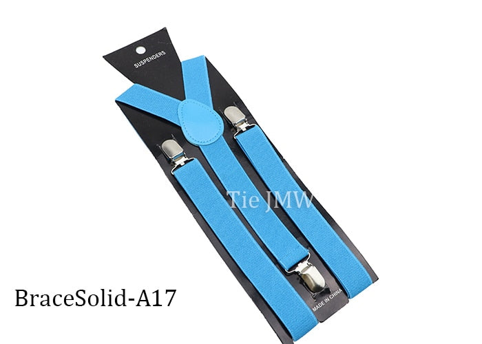 Leather Suspenders With Elastic Adjustable Straps.  Comes in a variety of solid Colors.