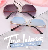 Women's rimless Gradient designer sunglasses.