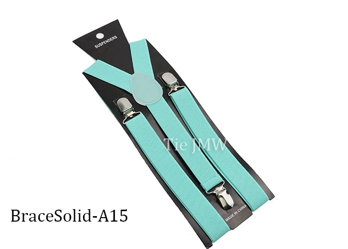 Leather Suspenders With Elastic Adjustable Straps.  Comes in a variety of solid Colors.