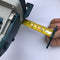 Gypsum Board Drywall/Woodworking cutting tool with measuring tape.