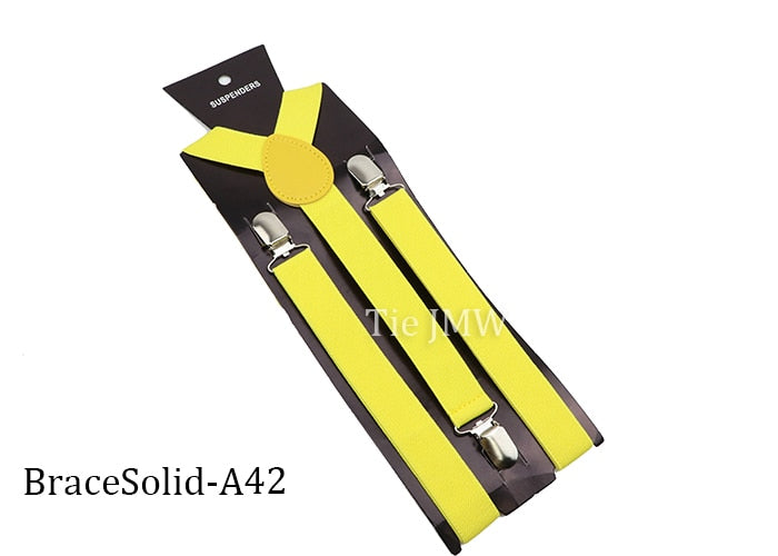 Leather Suspenders With Elastic Adjustable Straps.  Comes in a variety of solid Colors.