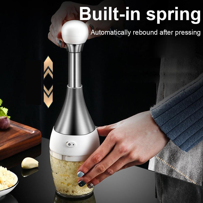 Stainless Steel manual food processor, chops garlic, onions, fruit and vegetables.