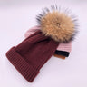 Wool/acrylic, fox fur pompom winter hats.